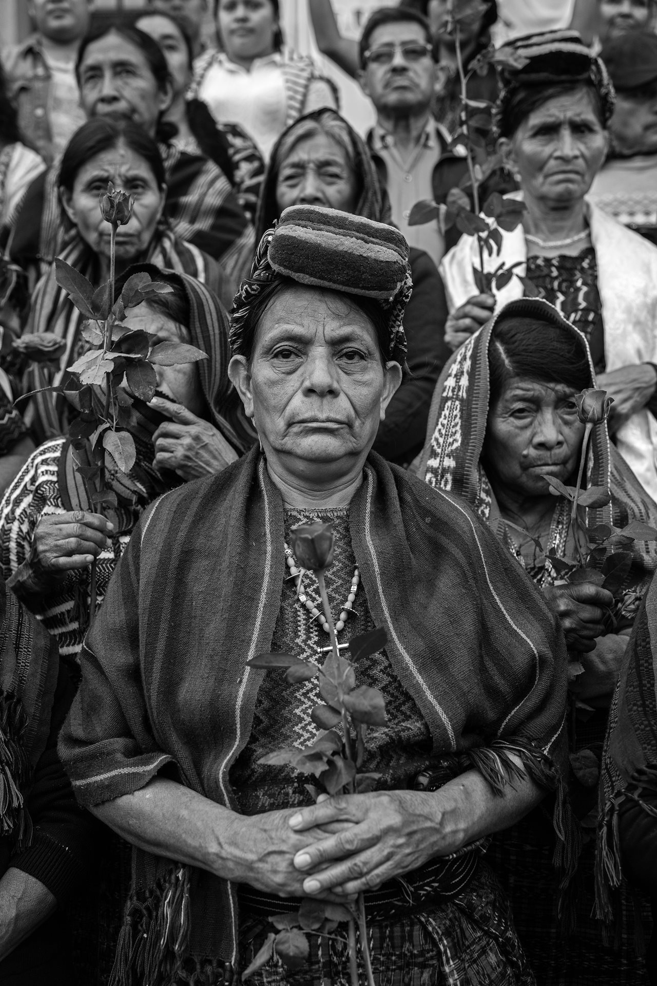 Doña Paulina Ixpatá Alvarado, a plaintiff who was held captive and assaulted for 25 days in 1983, stands with fellow Achi women outside a Guatemala City court in Guatemala. That afternoon, three former civil defense patrollers were sentenced to 40 years in prison for rape and crimes against humanity.
